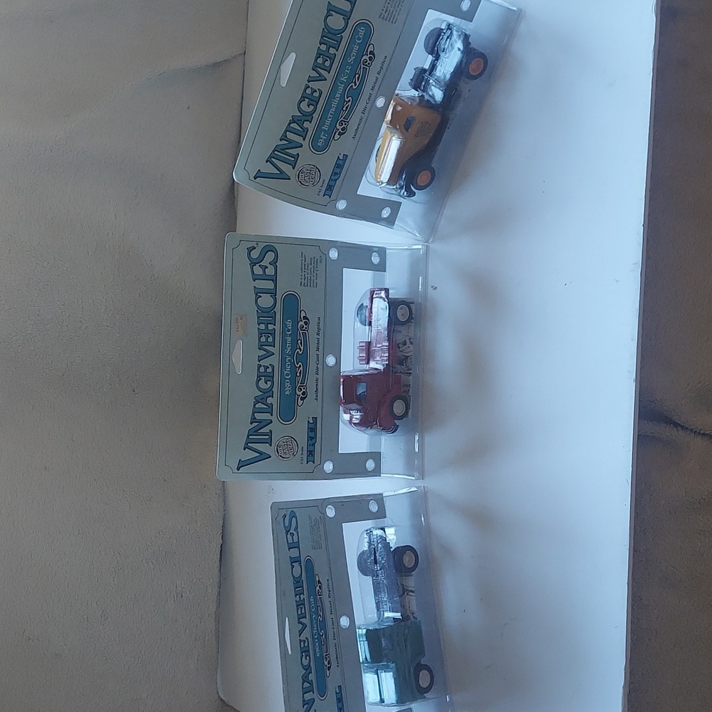 Vintage Vehicles made by ertl .Diecast metal trucks. Dated 1988 .New .